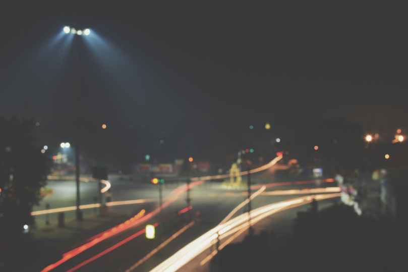 timelapse photography of roadway with car during nighttime
